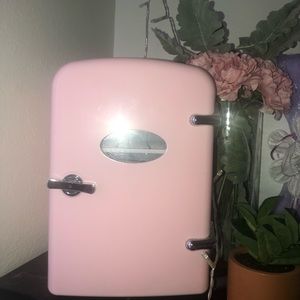 Light Pink Mini Fridge (usually for small snacks or skincare)